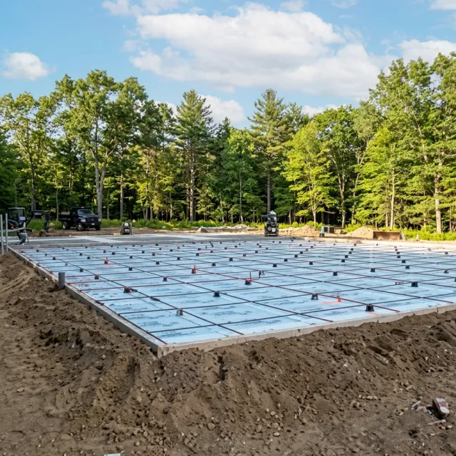 Large residential concrete slab under blue skies
